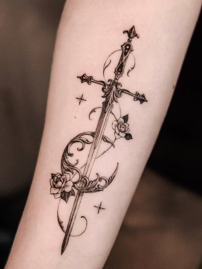 sword tattoo with moon and roses